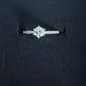 Solitaire Round-Cut White Gold Engagement Ring with Pavé Shoulders